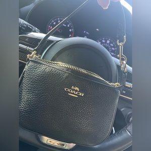 Coach wristlet black and gold